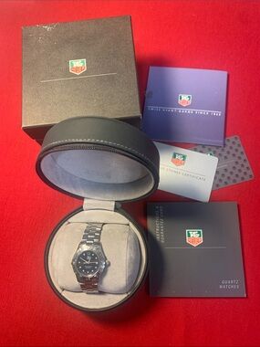 Tag Heuer Aquaracer Diving Watch with a black dial and diamond detailing